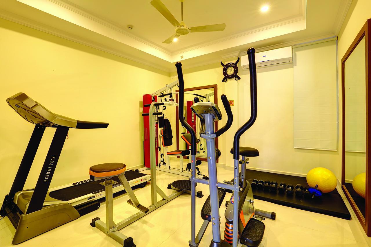 Hotel Floral Park Kottayam Bagian luar foto